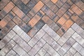 The background is made of rectangular paving stones of gray and brick color. Texture backgrounds for wallpaper graphics Royalty Free Stock Photo