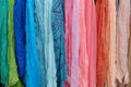 Background of many colorful pashmina scarves hanging Royalty Free Stock Photo