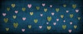 Background many pink, golden and olive hearts pattern on dark blue