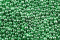 A background of many shiny green metal balls Royalty Free Stock Photo