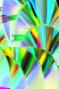 Lots CDs shiny colourful background. Royalty Free Stock Photo