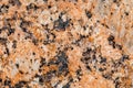 Background marble slab surface orange-black structure, uniform texture, close-up Royalty Free Stock Photo