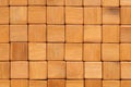 Background. The mat is made of square, sanded and varnished bamboo wood blocks