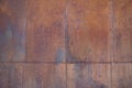 background of metal surface covered with tin sheets with brown rust Royalty Free Stock Photo