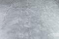 Background of Microcement grey floor with defects Royalty Free Stock Photo