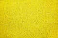 The background of millet (Latin Panicum miliaceum) is yellow. Cereals are useful products Royalty Free Stock Photo