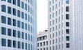 The background is a modern office block. Fragments of the white facades of the stylish building Royalty Free Stock Photo