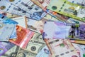 Background of money banknotes from different countries of the world, American, Saudi, Kuwaiti, Emirates and European money