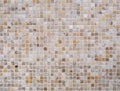 Background mosaic of square beige tiles