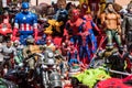 Background of movie and cartoon superheroes action figures toys.