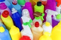 Background of multi-colored bottles with household chemicals