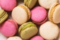 Background of multi-colored macaroon confectionery, close-up