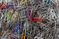 Background from multi-colored paper clips. Office tools. Clip Royalty Free Stock Photo