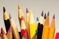 Background with multi-colored wooden pencils, soft focus