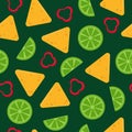 Background with nacho, slice of lime and chili on green - seamless pattern. Royalty Free Stock Photo