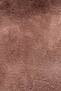 Background of natural cinnamon suede. Crafted hide and leather are used for tailoring fashionable comfortable outerwear, shoes and