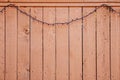 Background - Natural Wooden Plank Privacy Fence with fairly lights drooped at top Royalty Free Stock Photo