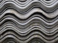 Background from old asbestos sheets for house roof stacked in a pile. Royalty Free Stock Photo