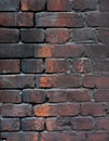 The background is an old brick wall. The wall is made of red ceramic bricks. Royalty Free Stock Photo