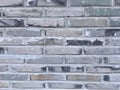 Background of old bricks wall, grey grunge texture. Royalty Free Stock Photo
