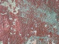 Background from an old coat of red paint peeling off a wall Royalty Free Stock Photo