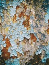 Background old concrete wall with cracked peeling paint, texture, multicolored