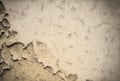 Background with old distressed cracked beige concrete wall