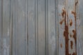 Metal fence with brown rust. Texture of galvanized rusty metal. Royalty Free Stock Photo