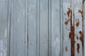 Metal fence with brown rust. Texture of galvanized rusty metal. Royalty Free Stock Photo