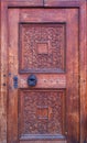background of old grunge, medieval wooden texture. part of antique old door with iron antique knob Royalty Free Stock Photo