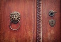 background of old grunge, medieval wooden texture. part of antique old door with iron antique knob