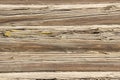 Background of old logs in close-up without unnecessary elements. An old log, cracks and moss Royalty Free Stock Photo