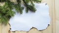 Background of old paper, wood and pine branches Royalty Free Stock Photo