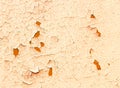 Old peeling orange painted wall. Close up Royalty Free Stock Photo