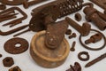 Background from old rusty bolts, screws, nuts, brackets, various metal details. Rusty set of hand tools. White background. Vintage Royalty Free Stock Photo