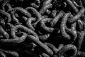 Old rusty metal chains with large links in a port Royalty Free Stock Photo