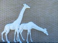 Background of old vintage brick with statue of giraffe wall textures Royalty Free Stock Photo
