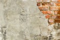 Background of old vintage brick wall with concrete,Weathered texture of racked concrete vintage brick wall background Royalty Free Stock Photo