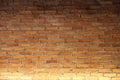 Red brick wall texture with vignetted corners and lighting design , may use to interior design. Royalty Free Stock Photo