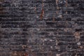 Background of old vintage dirty brick wall with peeling plaster, texture Royalty Free Stock Photo