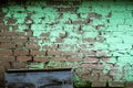 Background of old vintage dirty brick wall with peeling plaster, texture Royalty Free Stock Photo