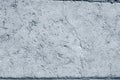 Background from old wall, texture damaged concrete surface, gray plaster, horizontal close-up photo.