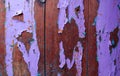 Background of old wood, painted with several layers of paint in different colors, side view