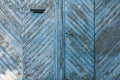 Gate with mail slot and door handle. Texture of wooden gate with old paint Royalty Free Stock Photo