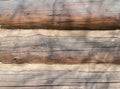 background from old wooden logs. wall of an old residential wooden rural house. Royalty Free Stock Photo