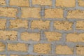 Background on an old yellow brick wall. Royalty Free Stock Photo
