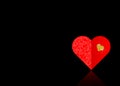 Background with one red paper florally decorated and one gold heart of glittering mosaic, the shape of a heart is from glitter Royalty Free Stock Photo