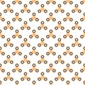 Background from orange children fidget spinners on white background. Playing backdrop of hand twisting toys with bearings in a row