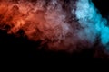 Background of orange, purple, red and blue wavy smoke on a black  ground. Abstract pattern of steam from vape of smoothly Royalty Free Stock Photo