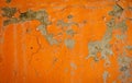 Background of an orange stucco coated and painted exterior, rough cast of cement and concrete wall texture, decorative rustic coat Royalty Free Stock Photo